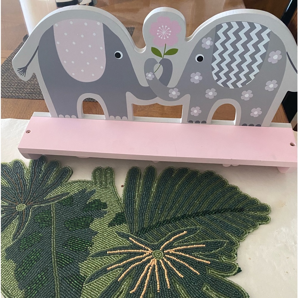 Darling elephant shelf for design and functionality.